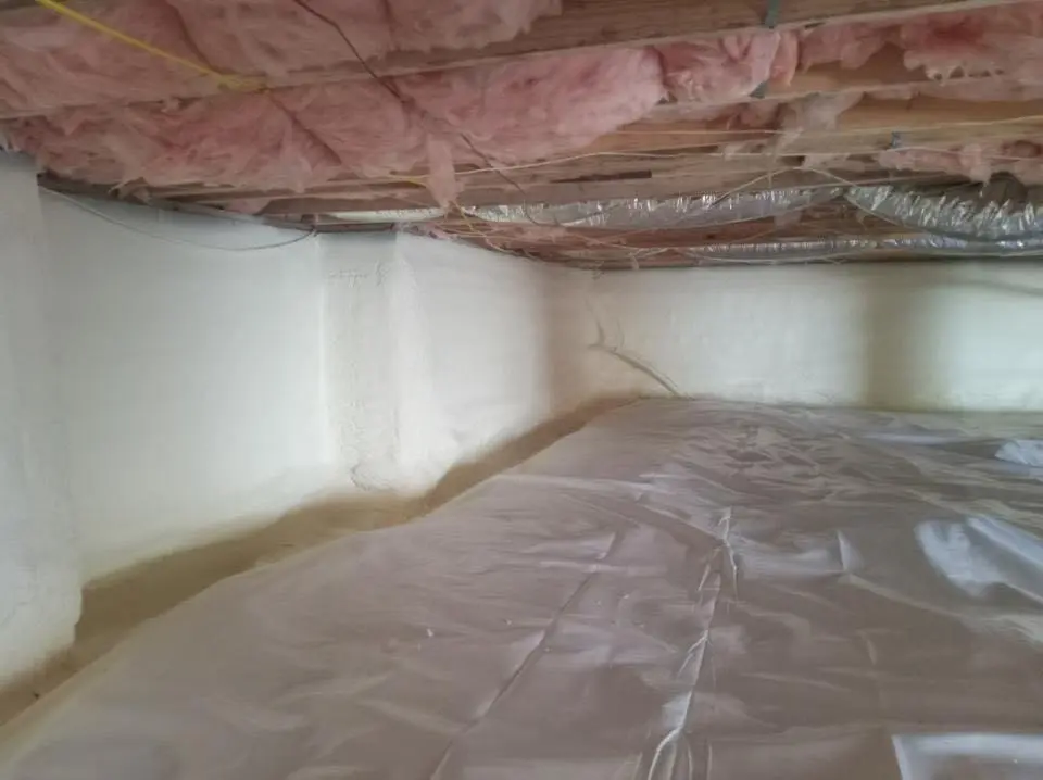 Crawl space encapsulation with closed-cell spray foam for Storm Damage Roof Repair in Williamstown